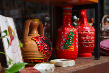 Old traditional oriental jugs in Tirana, Albania. Souvenirs for tourists. Clay, earthenware jar