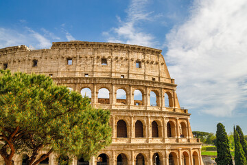 Fototapeta na wymiar The Colosseum amphitheatre in the centre of the city of Rome, Italy, Europe.