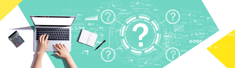Question marks with person using a laptop computer