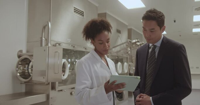 Doctors meeting in Science Laboratory Discussing Medical Test results