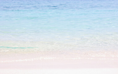 Fototapeta na wymiar Turquoise sea with sand beach for summer background.