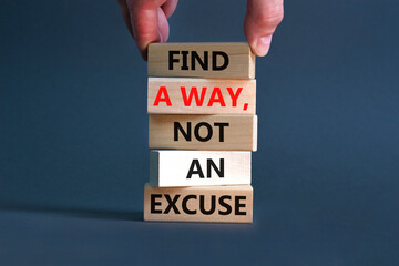 Find a way not excuse symbol. Concept words Find a way not an excuse on wooden blocks on a beautiful grey table grey background. Businessman hand. Business motivational and not excuse concept.