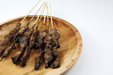 Chicken satay or 