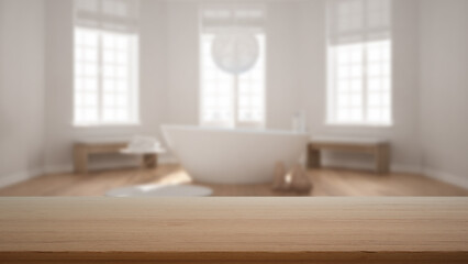 Empty wooden table, desk or shelf with blurred view of scandinavian white bathroom, bathtub,...