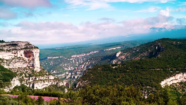 Timelapse of clouds moving over mountain landscape, Gorges de la Nesque and mont Ventoux, Vaucluse in Provence France. View from Belvedere de Saint Hubert.