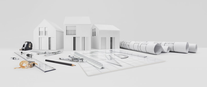 architectural model of houses on desk with drawing technical tools and blueprint rolls, isolated on white background, for building construction plan, interior designer and architect work concept