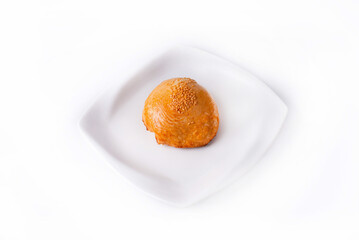 samsa in a white plate on a white background