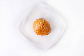 samsa in a white plate on a white background