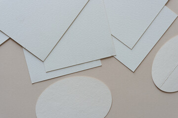 paper ovals and cards on a table
