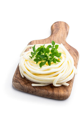 Chechil cheese with greek basil isolated on white