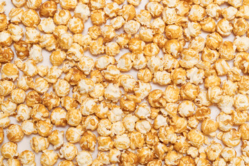 Golden caramel popcorn background