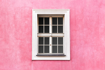 Fototapeta na wymiar Renaissance style window on pink wall color