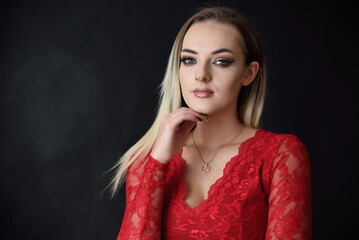 Studio photo session of young Polish model. Beautiful woman with dyed blond hairs and fit body shape.