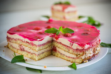 strawberry poppy cake with cream in a plate