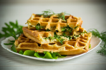Homemade fried vegetable waffles with herbs inside