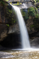Fototapeta premium Waterfalls and beautiful nature in the forest on Khao Yai National Park in Thailand.