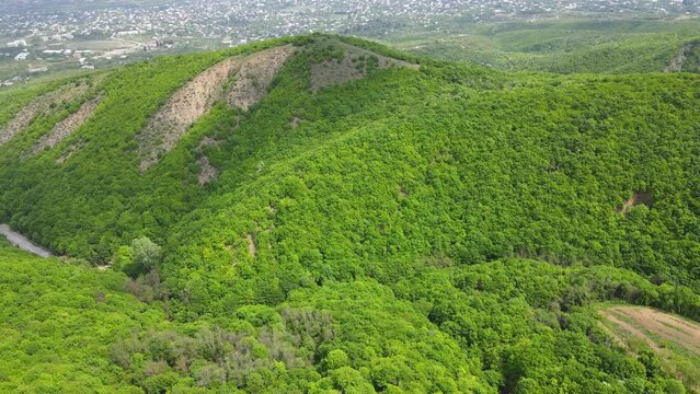 A camera drone flies over the Alazani Valley near the Monastery of St. Nino at Bodbe, Georgia