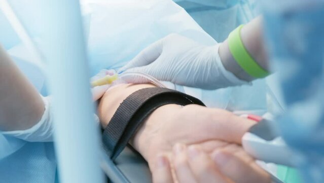 Medicine. The doctor put a catheter on the patient. modern medicine