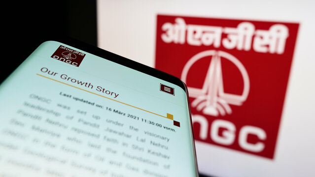 Stuttgart, Germany - 05-21-2022: Smartphone with website of Oil and Natural Gas Corporation Limited (ONGC) on screen in front of business logo. Focus on top-left of  phone display.