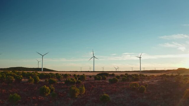 Wind energy packshot many wind turbines at the horizon clean green energy