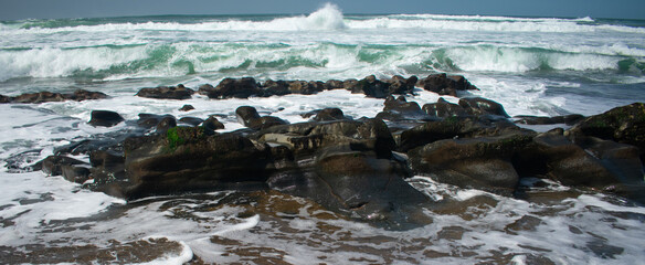 waves on rocks on the beach near salishan resort in portland oregon
