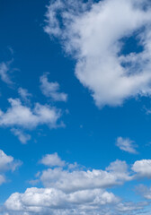blue sky and white puffy clouds 