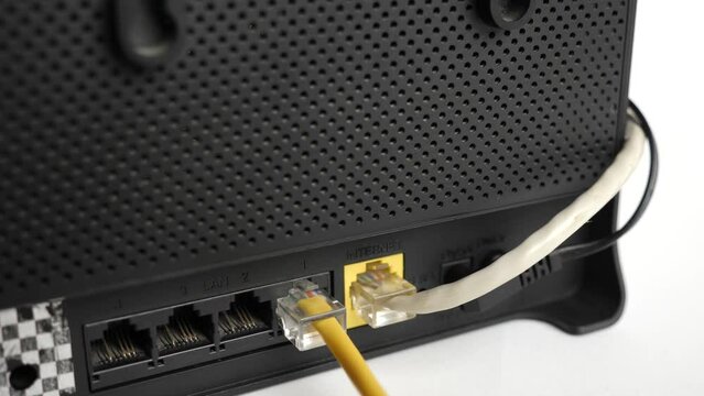A network cable for connecting to the Internet is connected to the router.