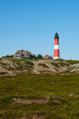Fototapeta na wymiar Lighthouse Hörnum in summer, Sylt, Schleswig-Holstein, Germany