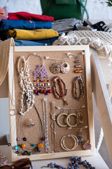 Swap party, market, second hand. Casual clothes, hats, bags and jewelry for sale. Event for exchange of clothes, shoes and accessories. Eco-friendly cloth exchange. Volunteering, donation