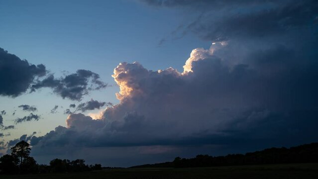 Timelaplse clouds motion on evening sky