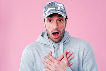 Furious and frustrated young man shocked, portrait of a handsome caucasian man