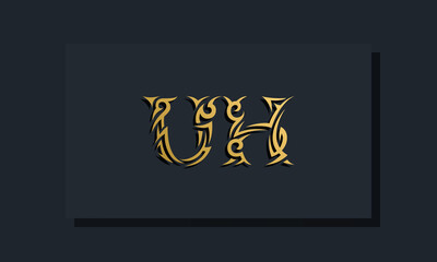 Luxury initial letters UH logo design. It will be use for Restaurant, Royalty, Boutique, Hotel, Heraldic, Jewelry, Fashion and other vector illustration