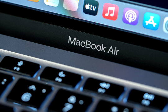 Poltava, Ukraine - June 4, 2022: Illustrative editorial of modern MacBook Air M1 laptop logo close up.