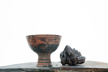 Ceremonial vessel with powerful crystal cluster.  Natural object still life photography.