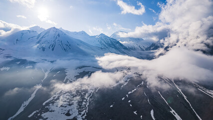 high angle view of amazing mountains covered with snow, aerial shot. High quality photo