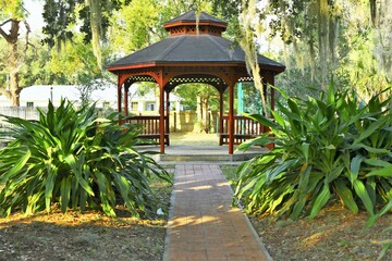 Decorative Gazebo in green luscious park  square in Florida USA