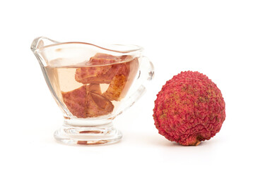 Tea from peel lychee isolated on white background.