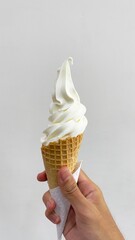 A cute ice cream in a hand