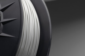 Filament for 3D printer. Filament for printing plastic parts on a 3D printer. Close-up - obrazy, fototapety, plakaty