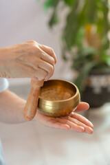 Close up of tibetan singing bowl with pattern in sound therapy.