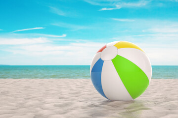 Fototapeta na wymiar colorful beach ball on beach
