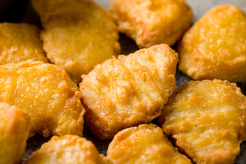 Fried chicken nuggets extreme macro close up