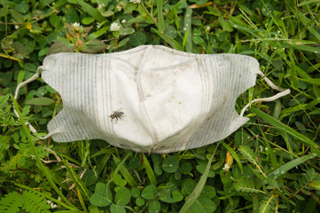 Used masks, hazardous waste that causes soil pollution because they cannot be recycled quickly by nature