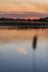 Naklejka premium sunset over lake
