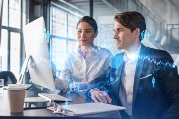 Businessman and businesswoman in formal wear working together looking for new employees to hire for international business consulting. HR, social media icons over modern panoramic office background