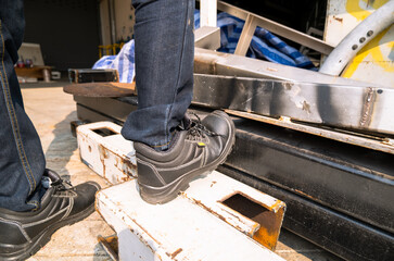 worker cutting steel
