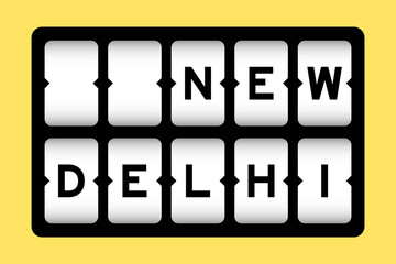 Black color in word new delhi on slot banner with yellow color background