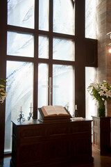 The solemn look of the modern interior of the chapel