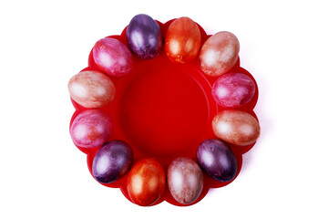 painted eggs for Easter are on a plate