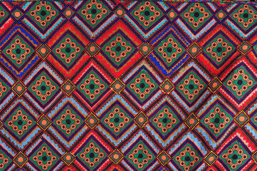 old Ukrainian embroidery in ornaments and patterns embroidered on a canvas